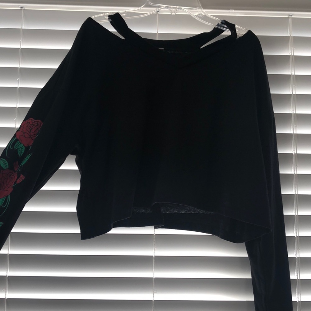 Black crop top, rose print on sleeves